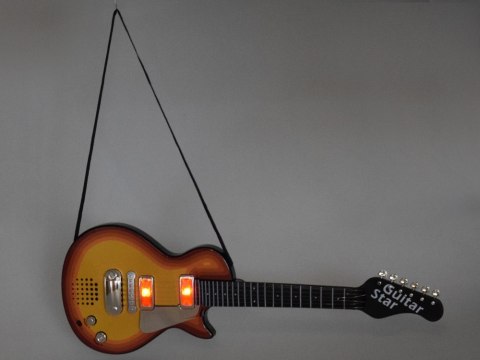 Gitara elektryczna zabawka dla dziecka melodie światło + pasek IN0169 CI Gitara elektryczna zabawka dla dziecka melodie światło + pasek IN0169 CI